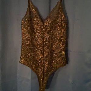 Glittery lace body suit
